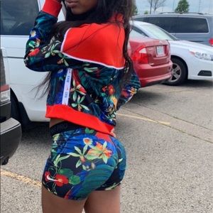 Nike jacket and spandex shorts